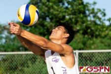 GW Gecko Nathan Castro connects with the ball in the first set of the matchup. (Photo by Michael Blas)