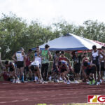 This Friday's IIAAG Track & Field Meet moves to the ocean scenery of J.F.K High. The sweltering heat was on but the fans and athletes still put on a show. (photo by Bout It Productions)