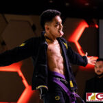 Peter Benevente finishes his opponent Don Rasa near the midway point of the Purple Belt Bout. (Photo by Michael Blas)
