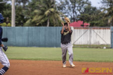 JFK Islanders Malcom Pangelinan secure the ball after the catch to end the inning. ( Photo by Bout It Productions )