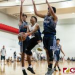 St. Paul Warriors Jaden Santos goes in for the layup while FBLG Hawks Gedfft Gozum and Ashle contests. (Photo by Michael Blas)