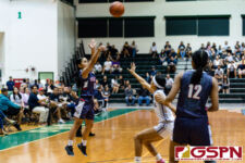 Okkodo Bulldog Racquel Camacho sinks in a three pointer early in the first quarter. (Photo by Michael Blas)