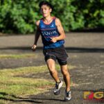 Zachary Criss participates in the run portion of the Super Sprint Relay division. (Photo by Michael Blas)