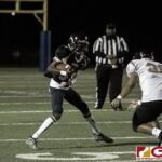 Guam High Panthers Andra Johnson looks to get by JFK Islanders Calairo Kristopher. (photo by Bout It Productions)