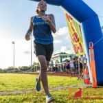 Guam High Panthers Tanea Henderson finishes in second place with a time of 22:16.64. (Photo by Michael Blas)