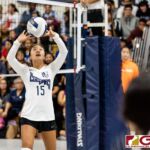 Cougar setter Melanie Damian aims for her outside hitter Coco Paulino in the 2nd set. (photo by Michael Blas)