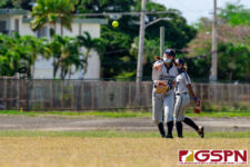Academy Cougar Bianwen Saville makes the catch at leftfield and sends it to third. (Photo by Michael Blas)