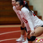 St. John's Knight Hallie Wigsten prepares for the serve in the third set of the game. (Photo by Michael Blas)