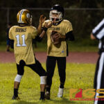 Tiyan Titan's Davin Mojico, right, and Juan Duenas celebrate after scoring a touchdown. (Photo by Michael Blas)