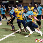 Southern Dolphin Conan Baza makes Guam High Panther Alexander Bow miss for a first down on the play. (Photo by Michael Blas)