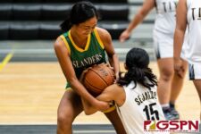 JFK Islander Jada Han and Tiyan Titan Andreyanna Sejalbo fight for possession of the ball. (Photo by Michael Blas)