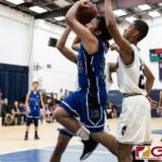 Bishop Obispos Johnny Rosario gets through the defender for a shot at the basket. (Photo by Michael Blas)