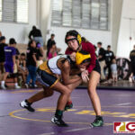 High School wrestlers hit the mats in a Preseason Tournament held at the FD Jungle. (photo by Bout It Productions.)
