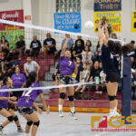 AOLG Cougar's Theisen Taimanglo, left, and Isabella Bargfrede, right, block GW Geckos Mikayla Castro's spike. (Photo by Michael Blas)