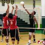 JFK Islanders Allen Blend gets the tip ball over to keep the Islanders in the game. (Photo by Michael Blas)