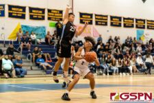 Guam High Panther Nick Keefe fakes out Southern Dolphin LV Ortega on a fast break. (Photo by Michael Blas)