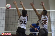 ND Royal Shayd Suarez gets his spike through the FD blockers Matt Santos and Elijah Garrido. (photo by Robert Balajadia)