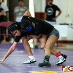 High School wrestlers hit the mats in a Preseason Tournament held at the FD Jungle. (photo by Bout It Productions.)