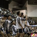 Harvest Eagles bench goes wild after their team keeps it to a close game. (photo by Bout It Productions)