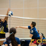 Guam High Panthers Alexia Brown makes a block against Harvest Christian Academy Eagles Carissa McMillan. (Photo by Michael Blas)