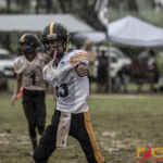 Tamuning Steelers Isaac Iriarte checks his place in line with the sideline referee. (photo by Bout It Productions)