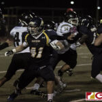 Guam High Panthers Kyle Datu puts in work on offense by protecting the runner. (photo by Bout It Productions)