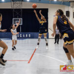 Guam High Panthers Taneena Henderson sinks the ball in from behind the three point line. (Photo by Michael Blas)