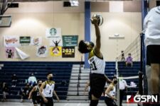 Tiyan High Titans VJ Rosario connects with the ball to bring it back over the net. Photo by Bout It Productions