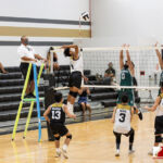 Tiyan High Titan Noel Ericsson goes airborne while the Jfk Islanders look to defend. Photo by Bout It Productions