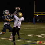 Guam High Panthers Abraham Guerrero deflects a pass from the receiver. (photo by Bout It Productions)