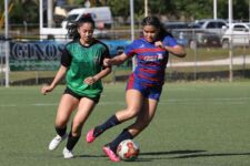 Bank of Guam Lady Strykers' Laurent Phillips moves the ball away from Islanders FC's Danni Jo Santos during a Week 9 match of the Bud Light Women's Soccer League Premier Division Sunday at the Guam Football Association National Training Center. The Lady Strykers won 2-0. Photo by Andee Tydingco / GFA