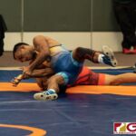 Lowe Bingham from Nauru in Blue putting moves against Guam's Lynch Santos in the 2019 United Word Wrestling Oceania Championship help at Leo Palace on Sunday April 21, 2019. (Photo by Michael Blas)