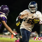 Guam High Panthers Jeylyn Dowdell drives the ball down the sideline while GW Geckos Jonah Garcia looks to make the tackle. (Photo by Michael Blas)