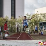 This Friday's IIAAG Track & Field Meet moves to the ocean scenery of J.F.K High. The sweltering heat was on but the fans and athletes still put on a show. (photo by Bout It Productions)