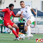 Guam Matao Forward Marcus Lopez and Maldives Hamza Mohamed fight for possession. (Photo by Michael Blas)