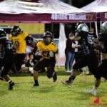 The Father Duenas Friars & The Simon Sanchez Sharks meet in the 2019 IIAAG High School Football Semifinals on Oct. 18, 2019. (photo by Bout It Productions). Productions).