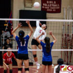 St. John's Knight Tylee Shepherd loads up for a kill in the first set of the game. (Photo by Michael Blas)