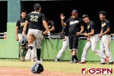 JFK Islander John Cruz catches the ND Royals of guard and steals home plate to tie the game 1-1. (Photo by Michael Blas)