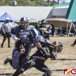 Island Stunnerz Lani Jackson introduces the stiff arm to Steel Blazing Saints Lucy Angeles.(photo by Bout It Productions)