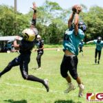 Southern Dolphin Isaac Jesus intercepts the pass from Titans Kaekoa Leon Guerrero. (Photo by Michael Blas)