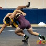 Father Duenas Friars Matias Calvo pins Guam High Panthers Julio Rosas in the 195 pound division of the 2018 IIAAG high school boys wrestling match. (Photo by Michael Blas)