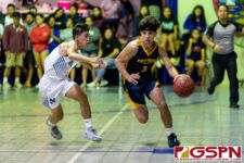 Guam High Panther Nick Keefe brings the ball down court early in the first quarter. (Photo by Michael Blas)