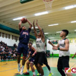 Okkodo Bulldogs Jon Michael Lorena grabs the offensive rebound and bounces back up to score. (Photo by Michael Blas)
