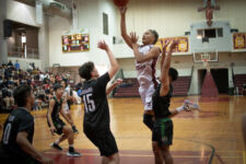The FD Friars defeated the JFK Islanders to advance to the ISA Boys Basketball Finals Wednesday evening. (photo by Raine Delos Reyes)