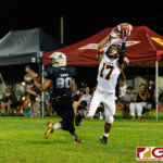 FD Friar Javian Cruz makes the catch in the end zone for the first touchdown of the game. (Photo by Michael Blas)