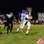 GW Gecko Ricky Macias keeps the ball and runs out of bounds to get the first down. (Photo by Michael Blas)