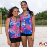 Hana Fernandez, left, and Laressa Halladay, right, placed third in the 2018-19 IIAAG Girls Beach Volleyball finals. (Photo by Michael Blas)