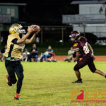 Tiyan Titans Kio Kaminanga makes the reception in the fourth quarter of the game. (Photo by Michael Blas)