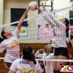 GW Gecko Cierra Martinez tips while Knights Tylee Shepherd gets a touch on the ball. (Photo by Michael Blas)