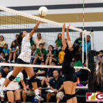 JFK Islander Kiana Rivera on a tip ball as Titans Kaila Owen gets up to contest. (Photo by Michael Blas)